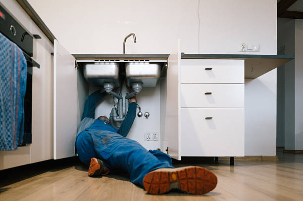 Professional Drain Cleaning technician working in Pettigrew, AR